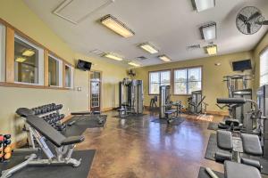 a fitness room with treadmills and cardio machines at Gorgeous Calabash Condo with Balcony and Pool Access! in Calabash