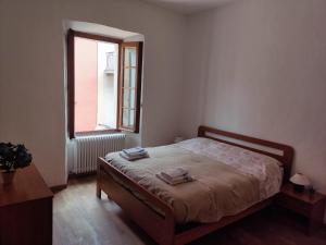 Posteľ alebo postele v izbe v ubytovaní Casa Colonne Fiorite