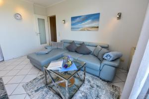 Ein Sitzbereich in der Unterkunft "Appartementhaus Deichgraf" Appartement D445