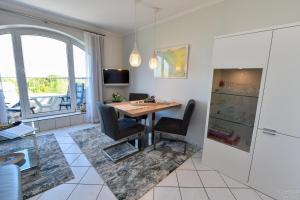 Ein Sitzbereich in der Unterkunft "Appartementhaus Deichgraf" Appartement D445