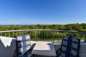 Ein Balkon oder eine Terrasse in der Unterkunft "Appartementhaus Deichgraf" Appartement D445