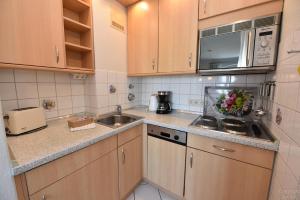 Küche/Küchenzeile in der Unterkunft "Appartementhaus Deichgraf" Appartement D445