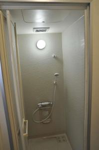 a bathroom with a shower stall with a toilet at Minpaku KEN HOUSE - Vacation STAY 60948v in Nagahama