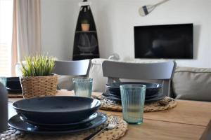Μια τηλεόραση ή/και κέντρο ψυχαγωγίας στο Apartament 27C-11- Łebska Ostoja +2 φωτογραφίες