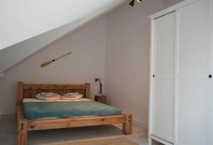 Ένα ή περισσότερα κρεβάτια σε δωμάτιο στο Apartament 27C-11- Łebska Ostoja