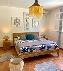 Postel nebo postele na pokoji v ubytování OCEAN LODGE Saint Anne Guadeloupe