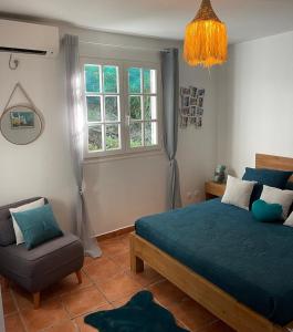 Postel nebo postele na pokoji v ubytování OCEAN LODGE Saint Anne Guadeloupe