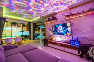 Et opholdsområde på P Henry&App2 Poolvilla Huahin