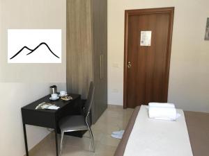 Posteľ alebo postele v izbe v ubytovaní Soggiorno Paradiso