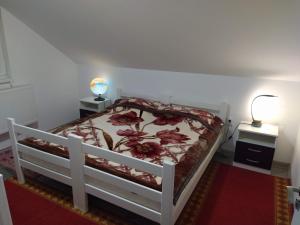 Postel nebo postele na pokoji v ubytování Apartmani Vukanac