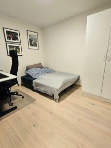Кровать или кровати в номере Koselig enderekkehus i nybygg!