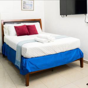 En eller flere senge i et værelse på HOTEL KRILESA