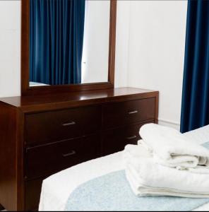 En eller flere senge i et værelse på HOTEL KRILESA
