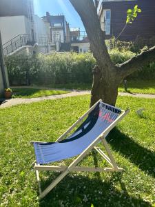 Vonkajšia záhrada v ubytovaní Villa Allegra Apartamenty z ogrodem i salą zabaw ,darmowy parking i leżaki, 5minut do morza