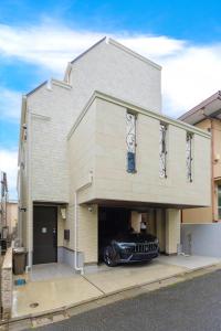 a garage with a car parked in it at 渋谷 広め50m2 2LDK 代々木公園駅徒歩5分 家族におすすめ in Tokyo