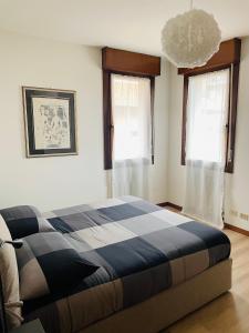Postel nebo postele na pokoji v ubytování Accogliente appartamento in centro