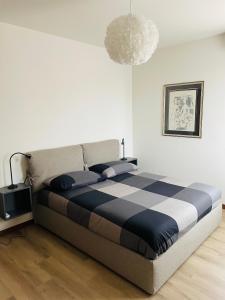 Postel nebo postele na pokoji v ubytování Accogliente appartamento in centro