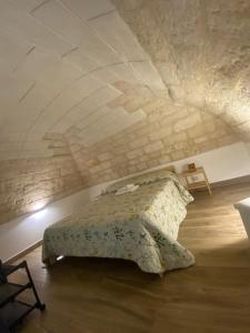 Ένα ή περισσότερα κρεβάτια σε δωμάτιο στο La Maison di Anto'