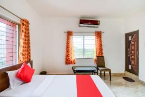 En eller flere senge i et værelse på Flagship Hotel Creation Premium