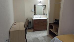Koupelna v ubytování Hotel Yahalis + 16 fotografií