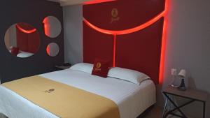 Postel nebo postele na pokoji v ubytování Hotel Yahalis