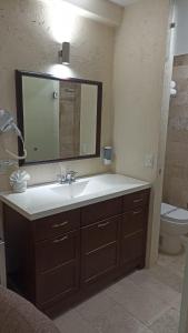 Koupelna v ubytování Hotel Yahalis