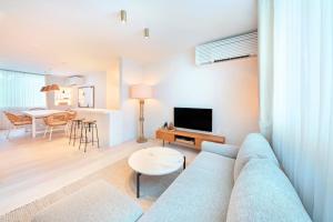 TV a/nebo společenská místnost v ubytování Pricia Resort Yoron