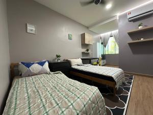 Ένα ή περισσότερα κρεβάτια σε δωμάτιο στο Self Check in Homestay ,Free Wifi Parking