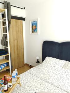 Una cama o camas en una habitación de Monaco Cap d’ail Studio & jardin