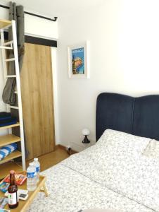 Postel nebo postele na pokoji v ubytování Monaco Cap d’ail Studio & jardin