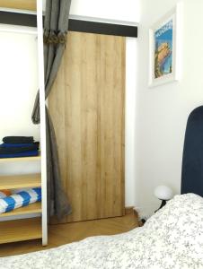 Postel nebo postele na pokoji v ubytování Monaco Cap d’ail Studio & jardin