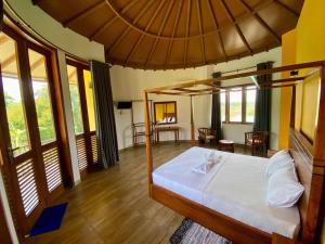 Postel nebo postele na pokoji v ubytování Senu Lagoon Villa