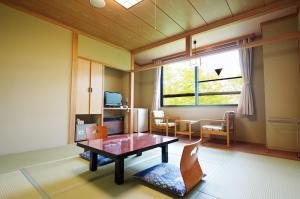 A television and/or entertainment centre at ピーポロ乗鞍