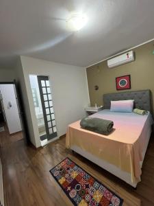 Säng eller sängar i ett rum på Casa do Zafer