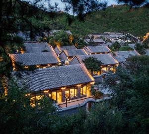 a row of houses in a village at night at Jinshanling Great Wall Hotel in Chengde