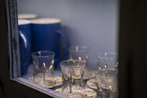 a group of wine glasses sitting on a table at Byzantine Home in the Castle in Mestá +70 photos