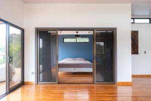 Ένα ή περισσότερα κρεβάτια σε δωμάτιο στο El Nido Cúbico