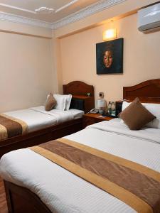 Llit o llits en una habitació de Hotel Bodhiz
