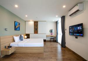 Телевізор і / або розважальний центр в FIRST Studio Hotel Da Nang