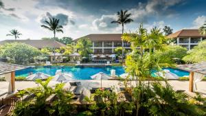 an aerial view of the resort with a large swimming pool at Bandara Spa Resort & Pool Villas, Samui in Bophut