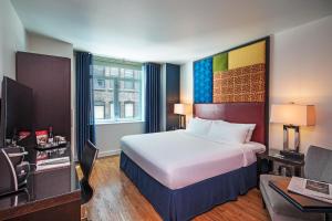 Ένα ή περισσότερα κρεβάτια σε δωμάτιο στο Hotel Hayden New York