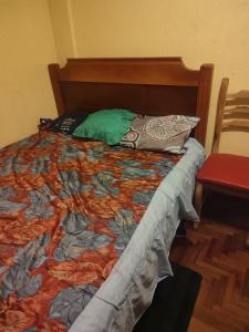 Postel nebo postele na pokoji v ubytování Un Hogar Quiteño