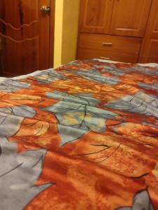 Postel nebo postele na pokoji v ubytování Un Hogar Quiteño