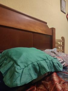 Postel nebo postele na pokoji v ubytování Un Hogar Quiteño