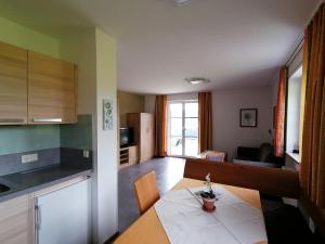 A kitchen or kitchenette at Apartmenthaus Oberlehen