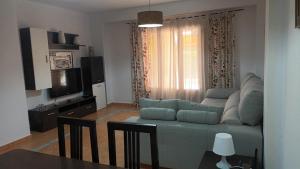 Televízia a/alebo spoločenská miestnosť v ubytovaní Encartador Apartamento para Descanso Vacacional