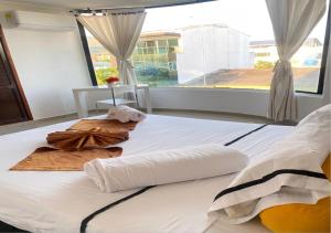 Krevet ili kreveti u jedinici u okviru objekta HOTEL MANÁ S.A.S.