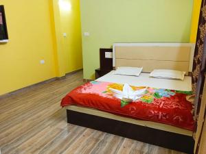 Postel nebo postele na pokoji v ubytování Sea Smile Inn