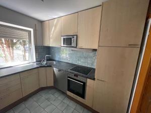 Küche/Küchenzeile in der Unterkunft Apartment Köln Porz