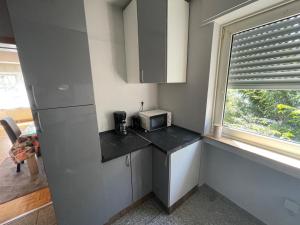 Küche/Küchenzeile in der Unterkunft Apartment Köln Porz